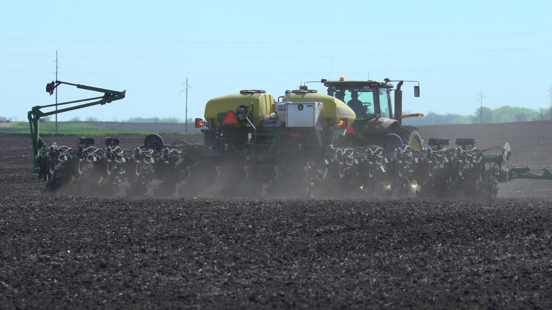This agronomic image shows a seed planter