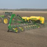 This agronomic image shows a seed planter