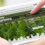 a tablet with grow more experience virtual tours displayed